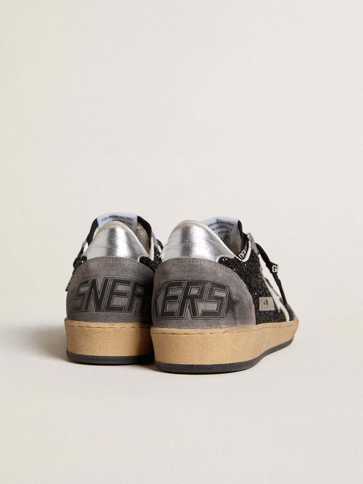 Glitter con stella in pelle e talloncino in pelle laminata