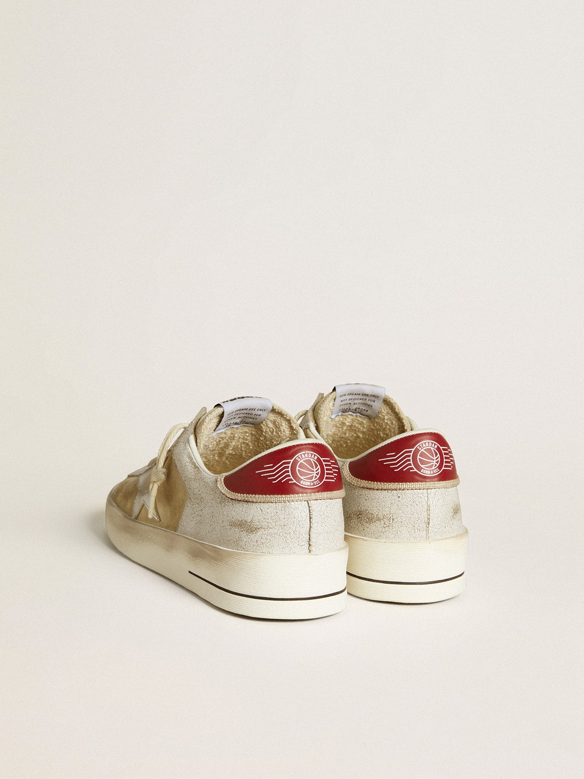 Nabuk e pelle cracklé con stella in pelle laminata argento
