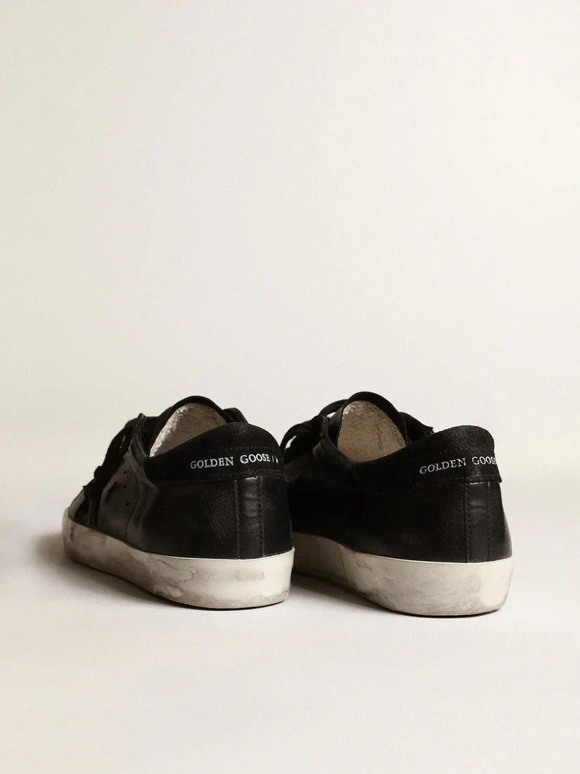 Nappa nera con stella e talloncino in suede nero