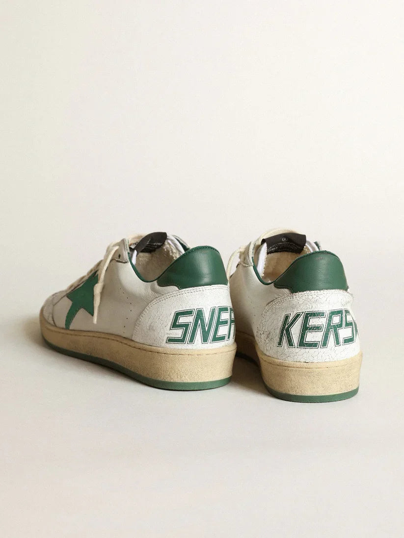 Nappa bianca con stella e talloncino in pelle verde