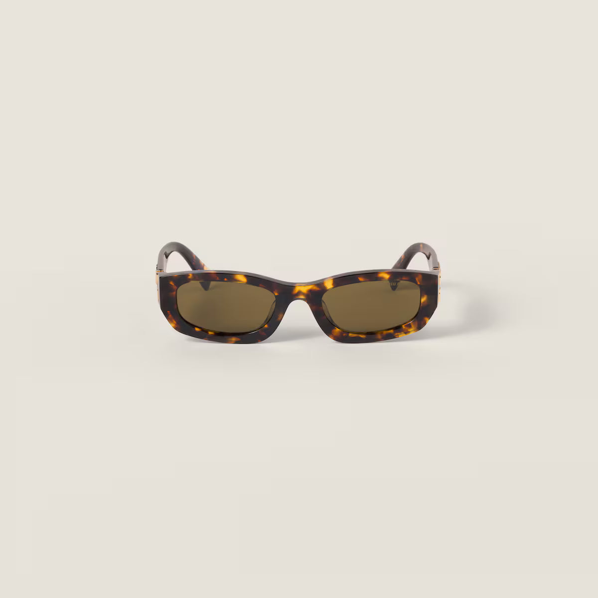 Occhiali da sole Miu Glimpse con forme basse montatura tartaruga miele Lenti Verde Loden