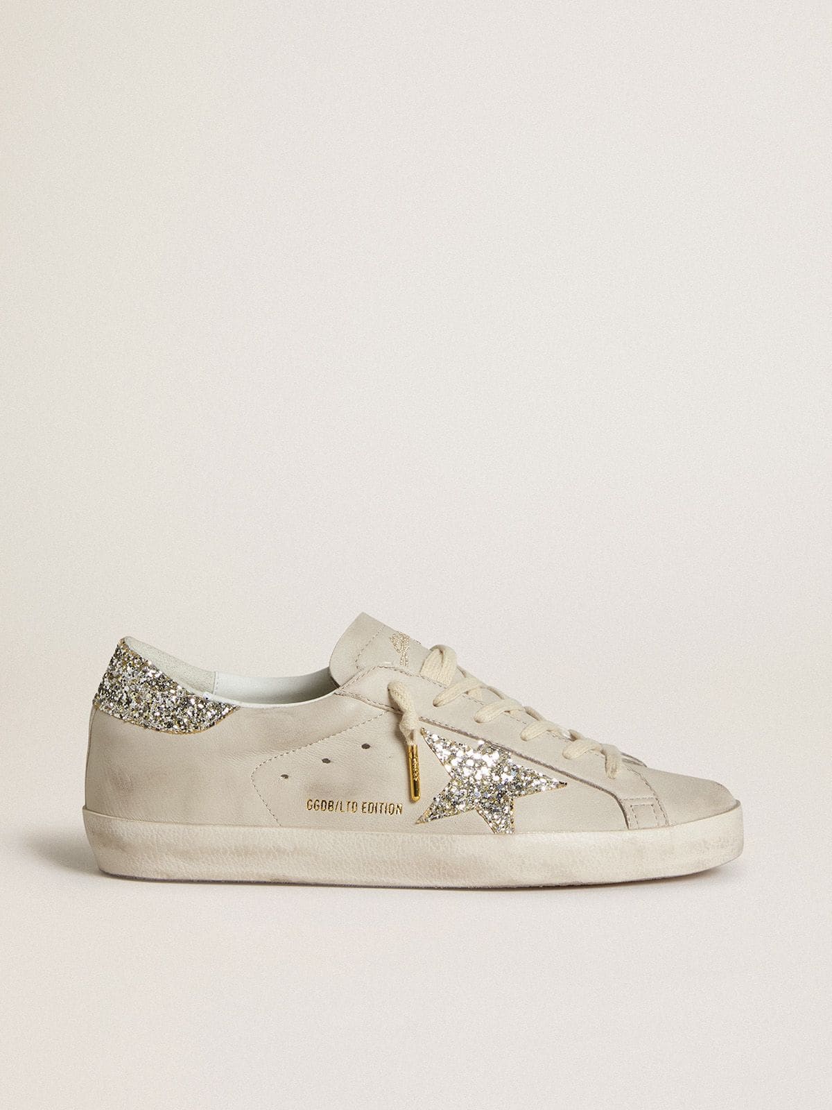 LTD in nappa avorio con stella e talloncino in glitter platino