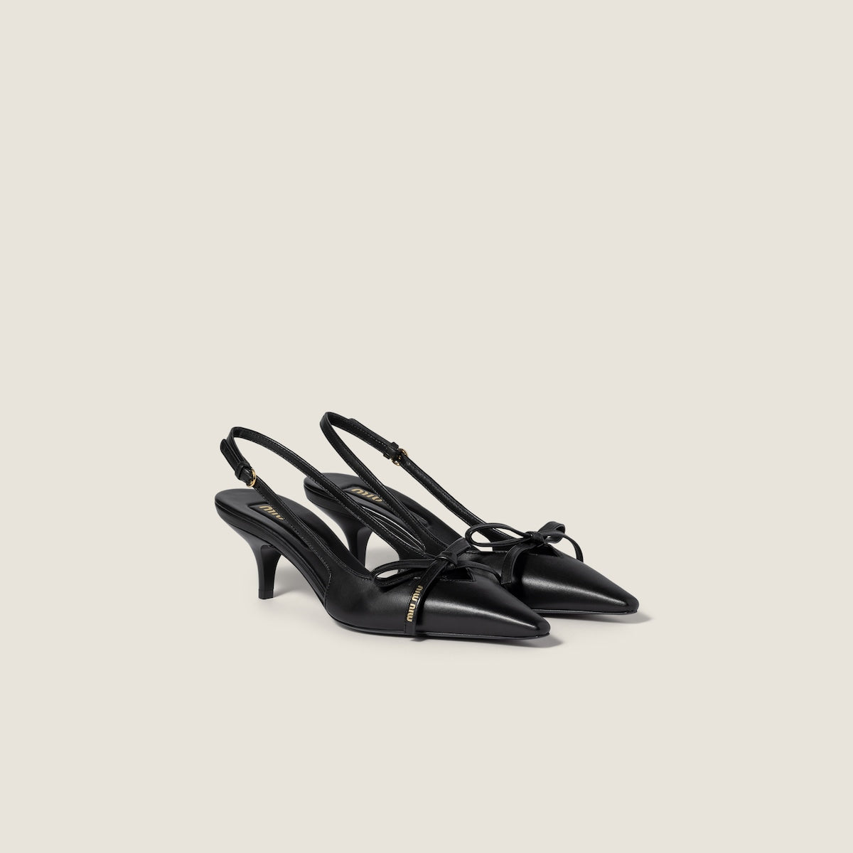 Décolleté slingback in pelle con fiocco nero