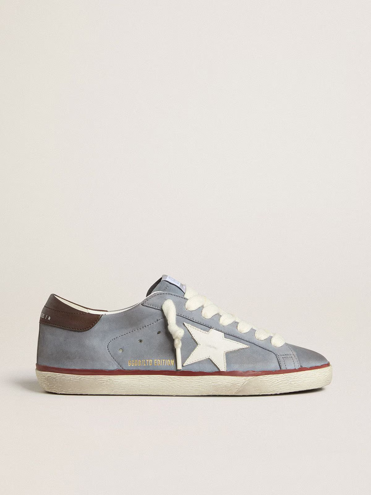 LTD in pelle nabuk azzurra con stella in pelle bianca e talloncino in pelle marrone