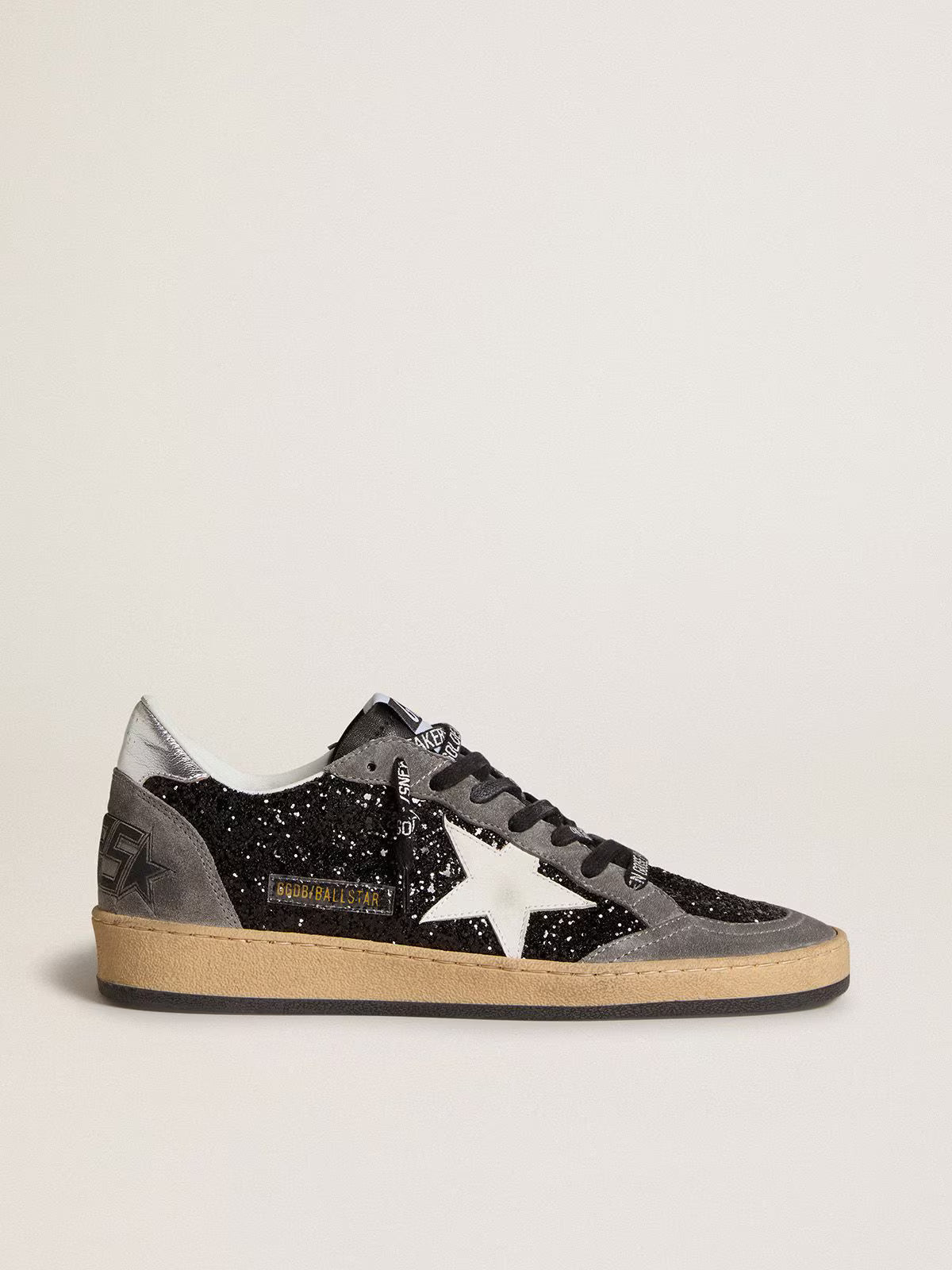 Glitter con stella in pelle e talloncino in pelle laminata