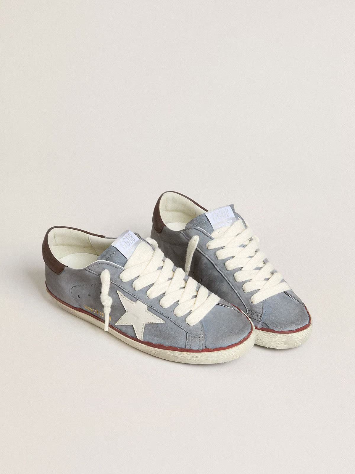 LTD in pelle nabuk azzurra con stella in pelle bianca e talloncino in pelle marrone