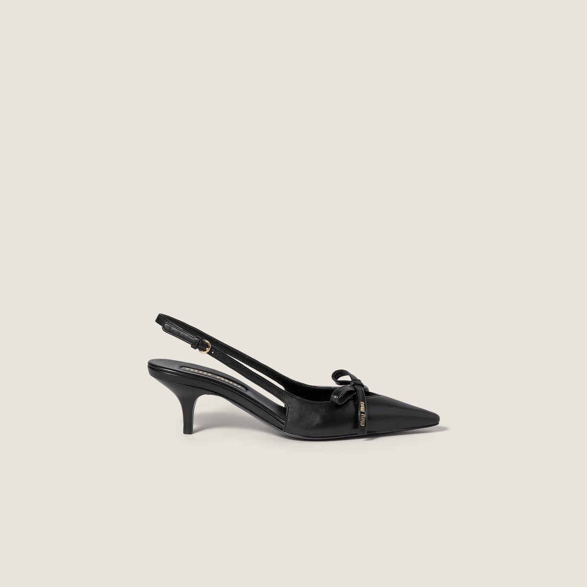 Décolleté slingback in pelle con fiocco nero
