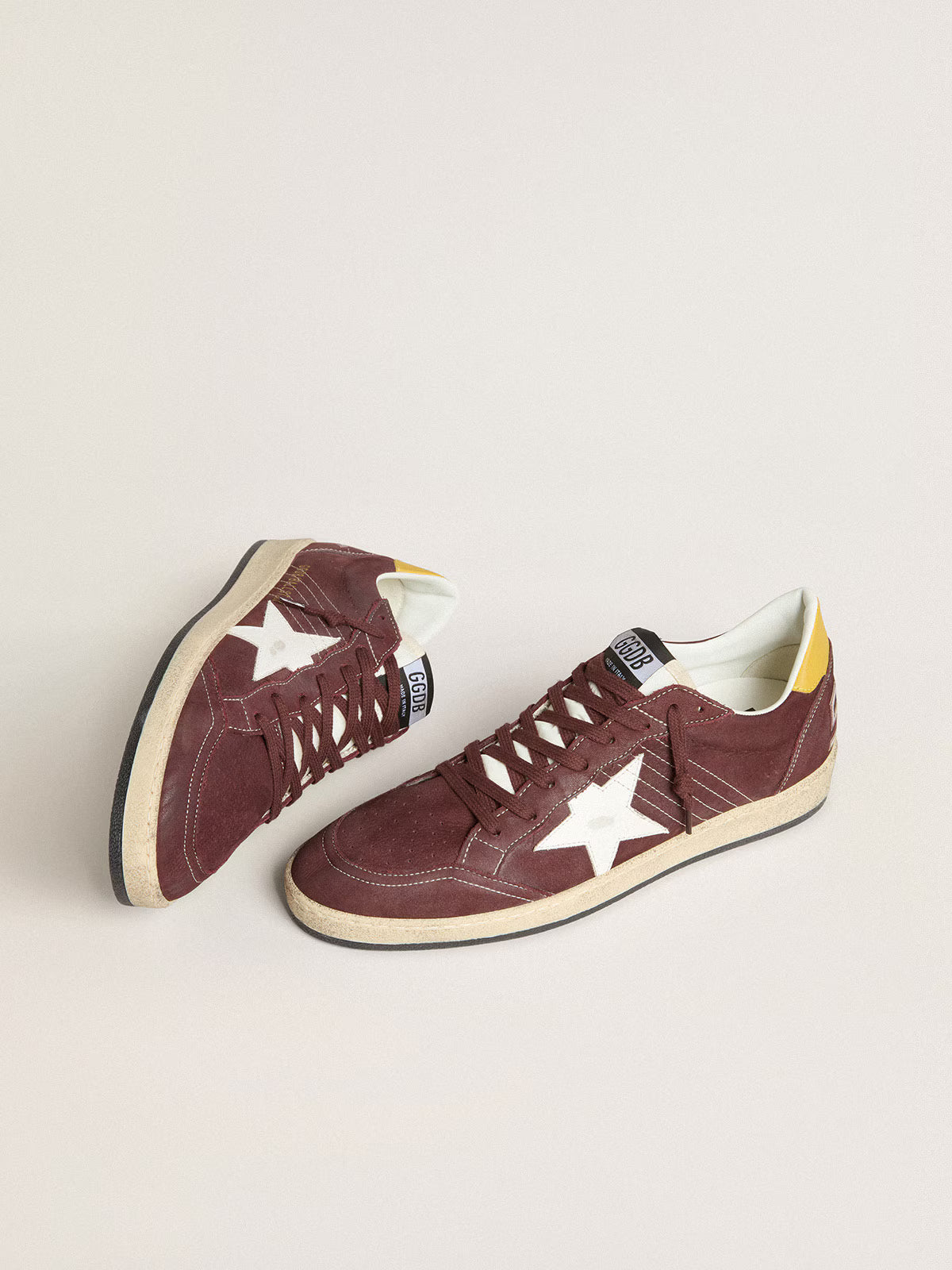 Nabuk cioccolato con stella e talloncino in pelle