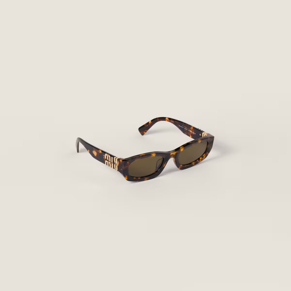 Occhiali da sole Miu Glimpse con forme basse montatura tartaruga miele Lenti Verde Loden