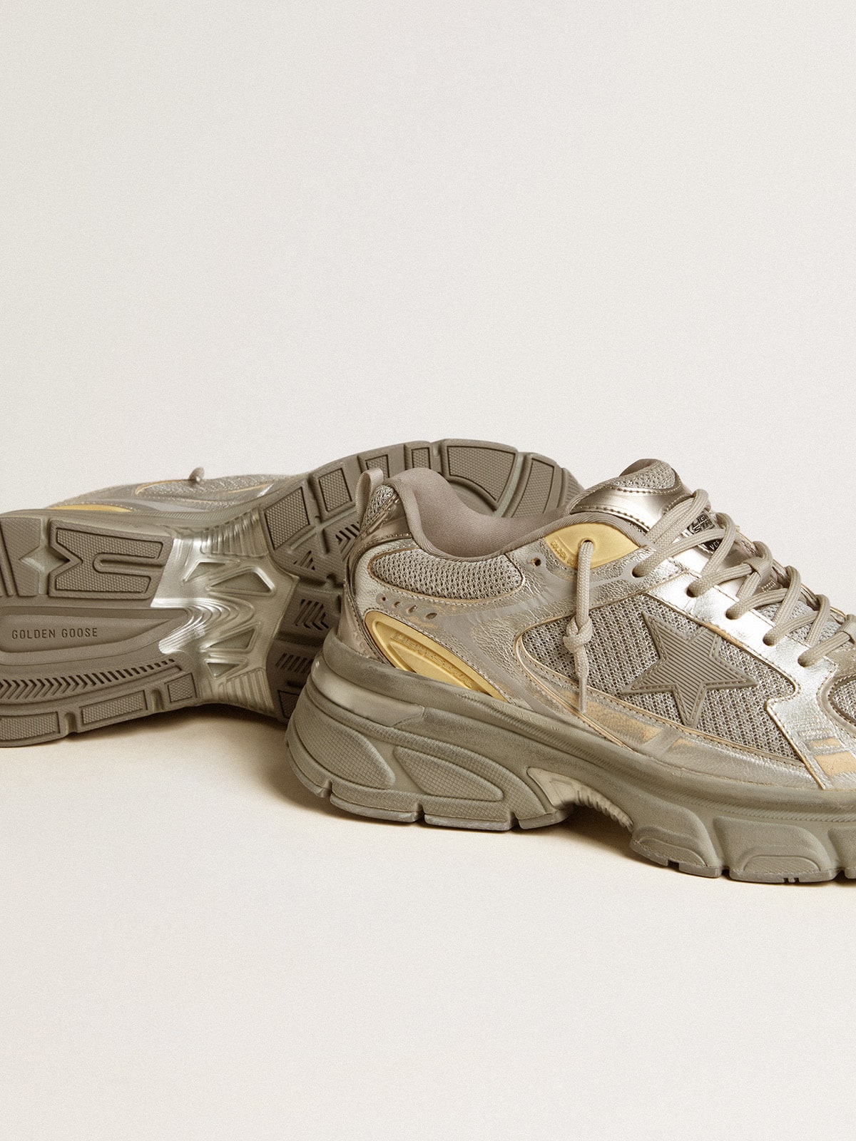 Lightstar in pelle laminata e mesh argento e stella grigia