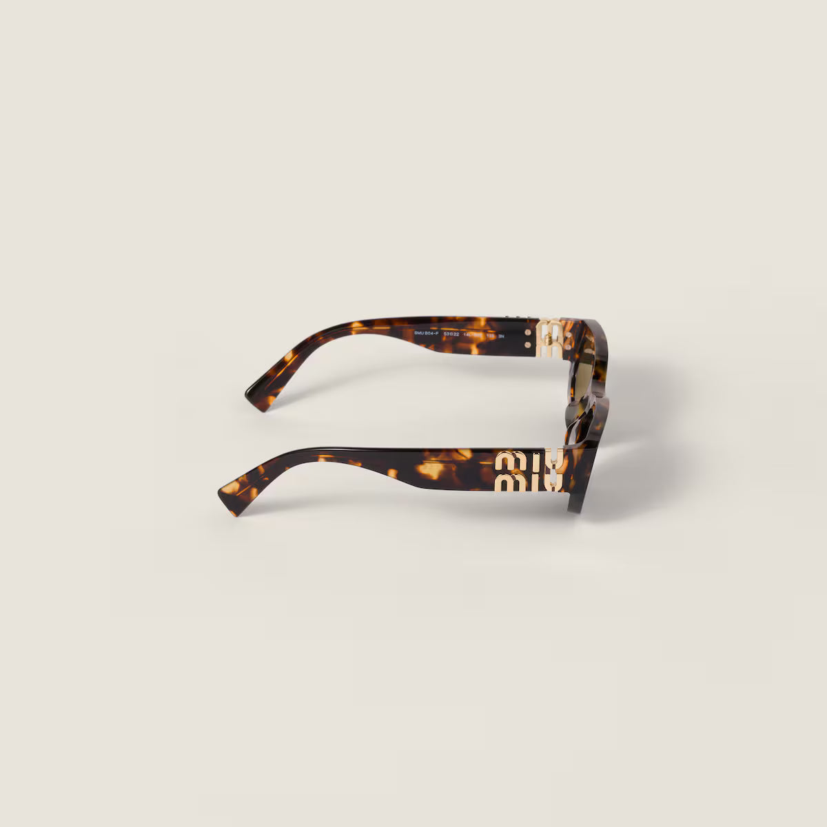 Occhiali da sole Miu Glimpse con forme basse montatura tartaruga miele Lenti Verde Loden