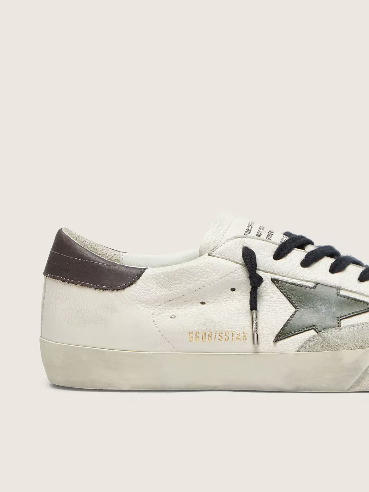 Nappa con stella in pelle verde e talloncino in pelle grigia