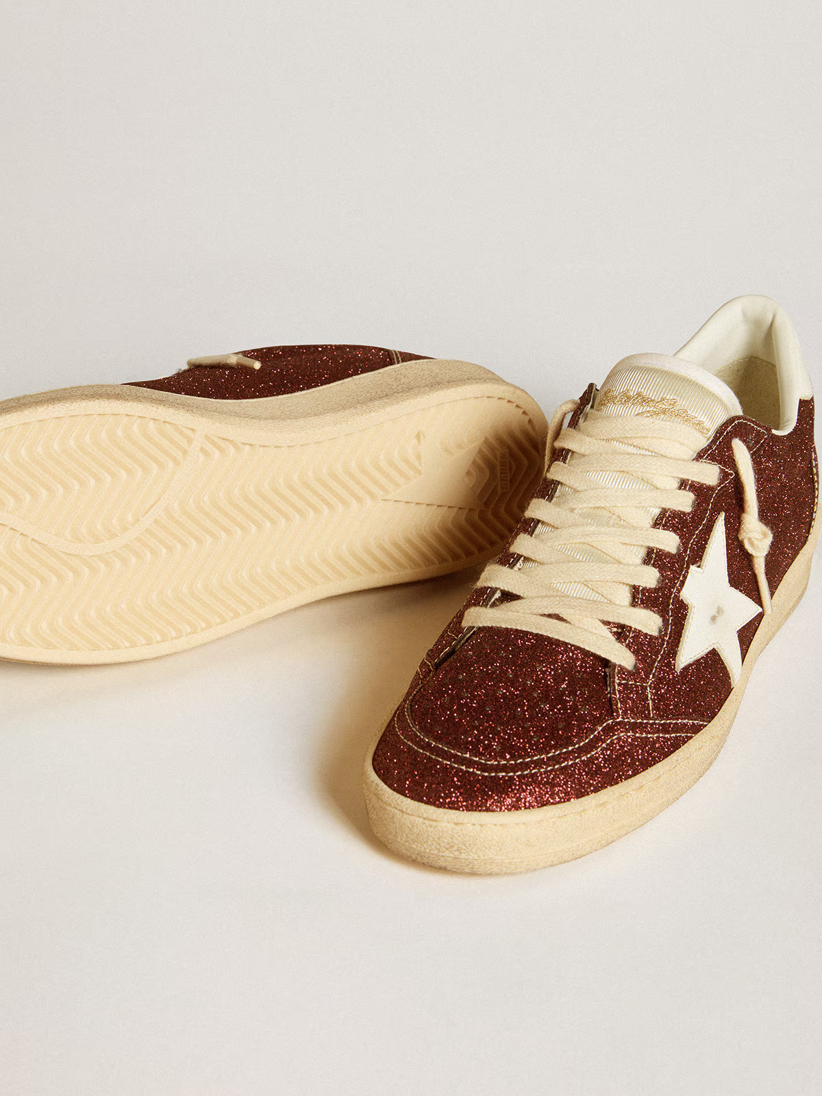 Glitter bordeaux con stella e talloncino in pelle bianca