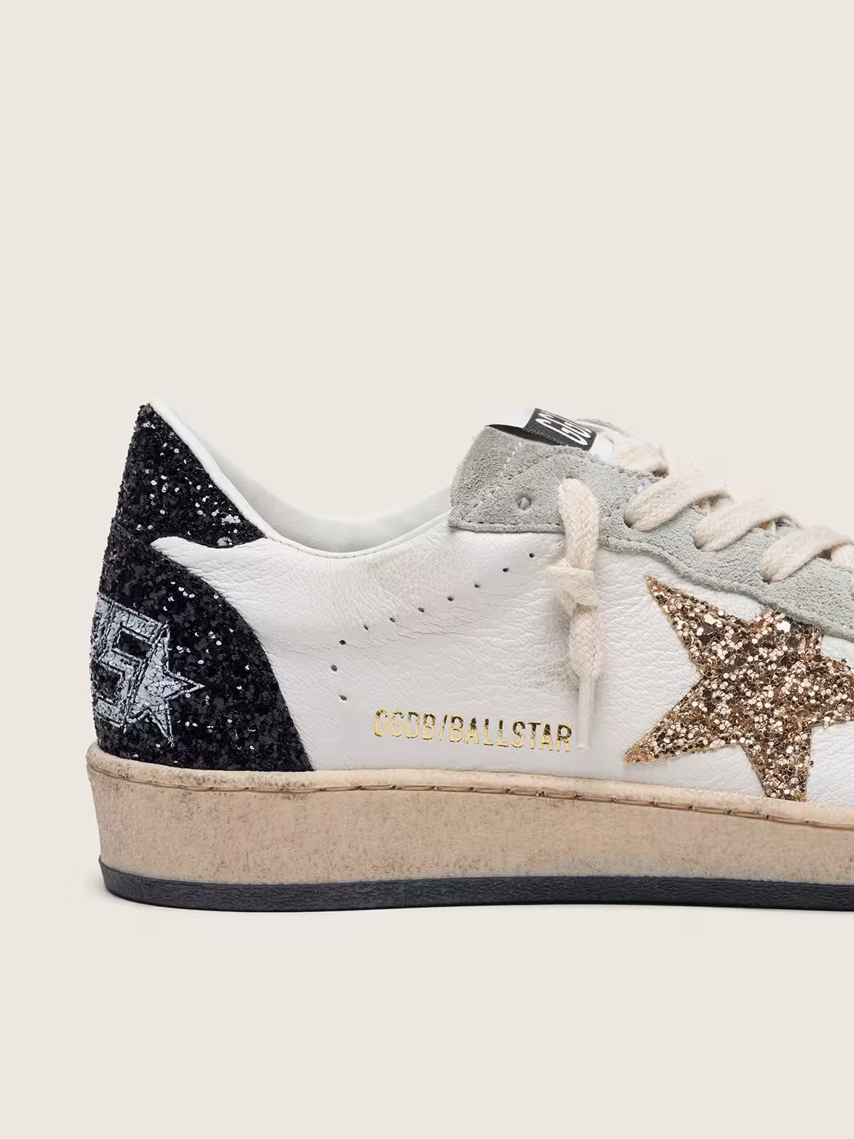 Nappa e suede con stella in glitter e talloncino nero