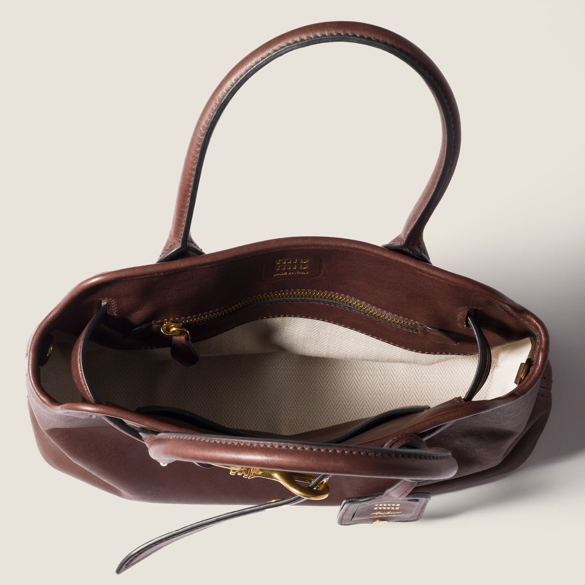 Borsa Aventure media in nappa radica