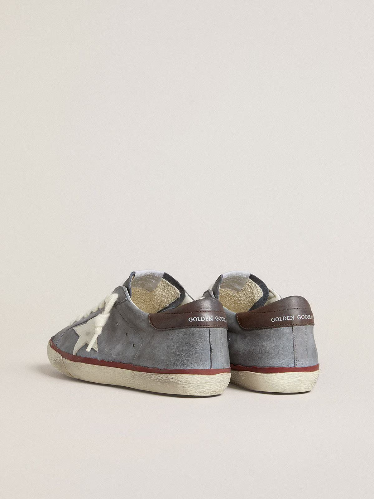 LTD in pelle nabuk azzurra con stella in pelle bianca e talloncino in pelle marrone