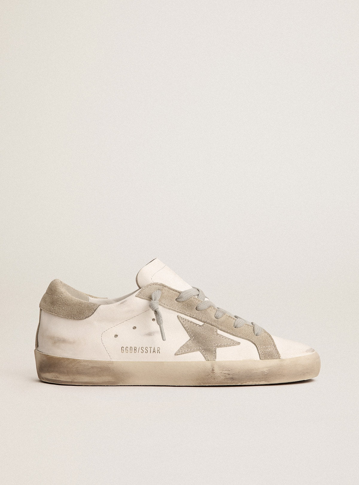 Stella e talloncino in suede grigio