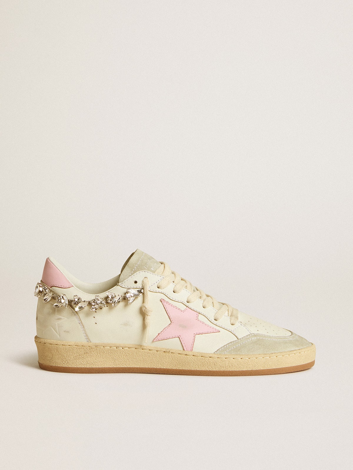 Donna LTD con stella in pelle rosa e applicazione con cristalli