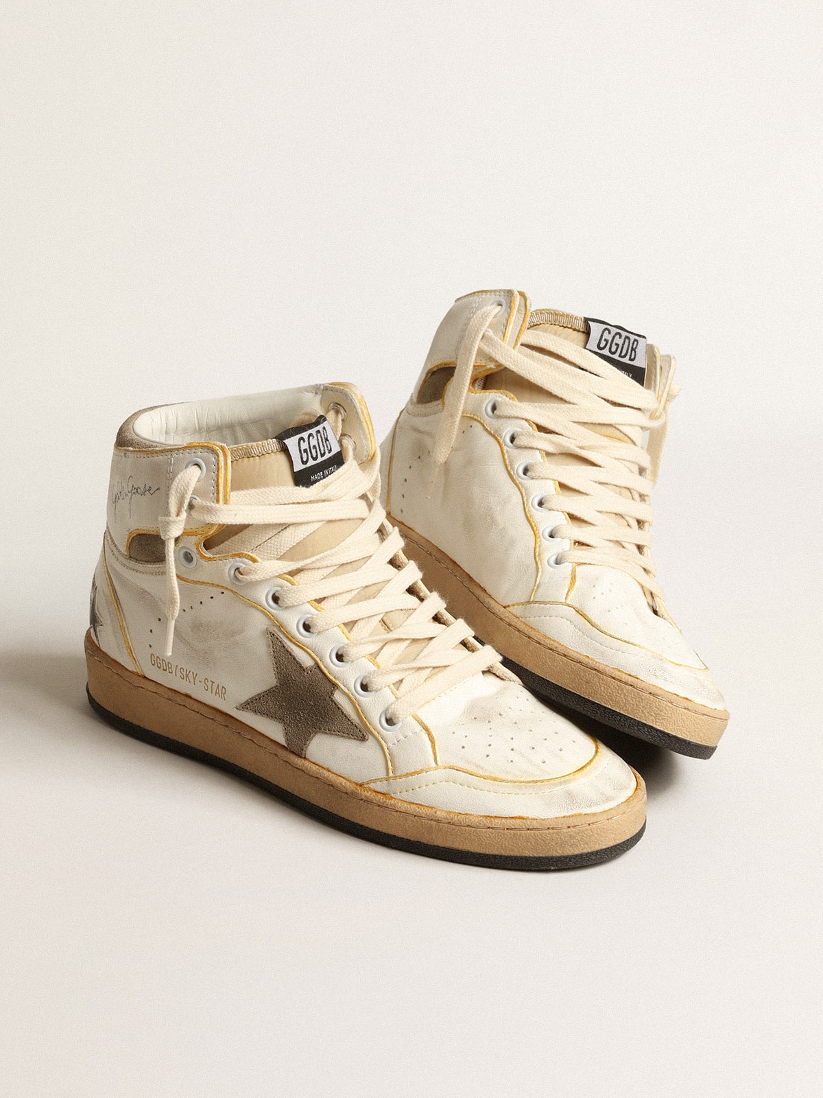 Nappa bianca con stella in suede color tortora