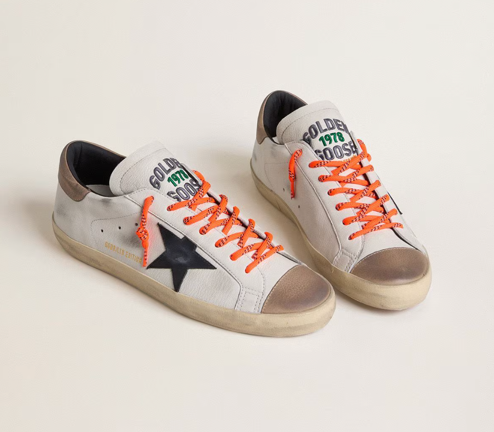 Golden Goose Super-Star Uomo LTD in pelle con stella in pelle nera e talloncino in pelle beige